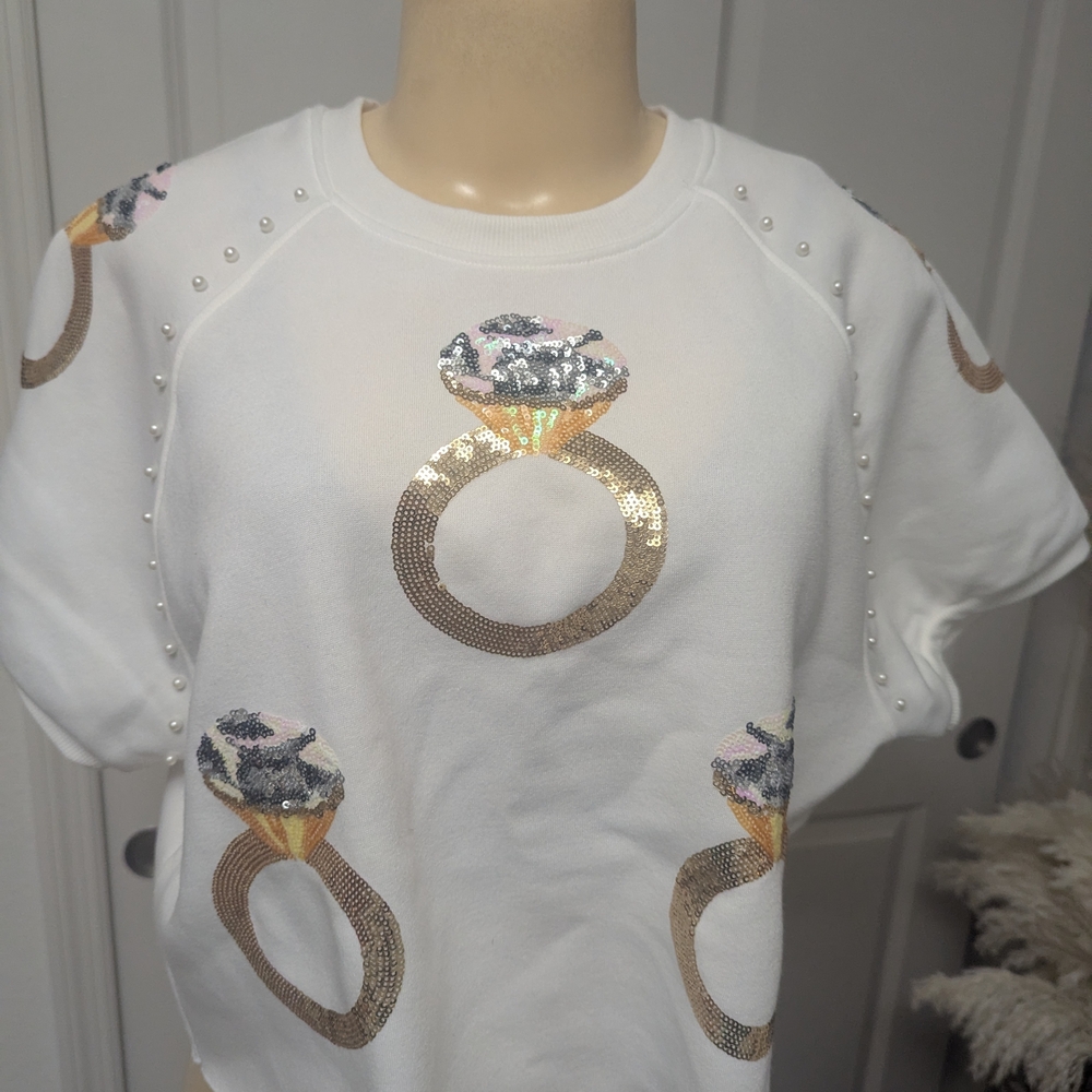 Versona White Blouse with Gold and Silver Ring Design